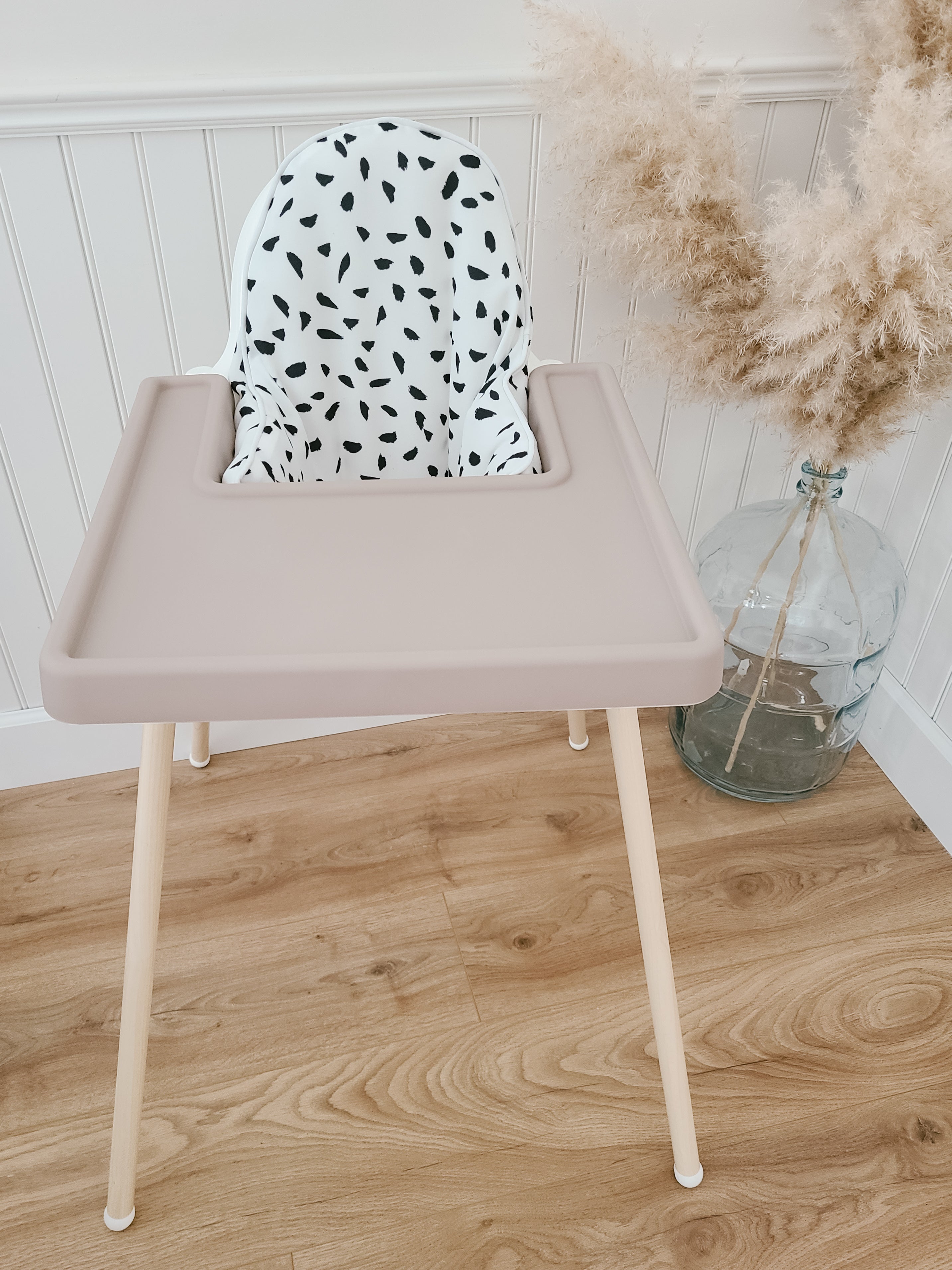 Ikea highchair diy hack with accessories.  Cushion cover, placemat, footrest and leg wraps