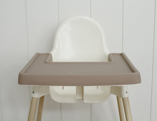 Ikea highchair diy hack with accessories.  Cushion cover, placemat, footrest and leg wraps taupe neutral color